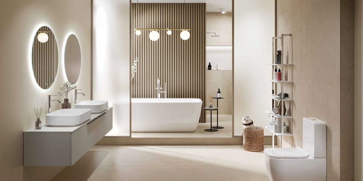 Bathroom with twin backlit mirrors, a double basin, a freestanding bath and a walk-in shower