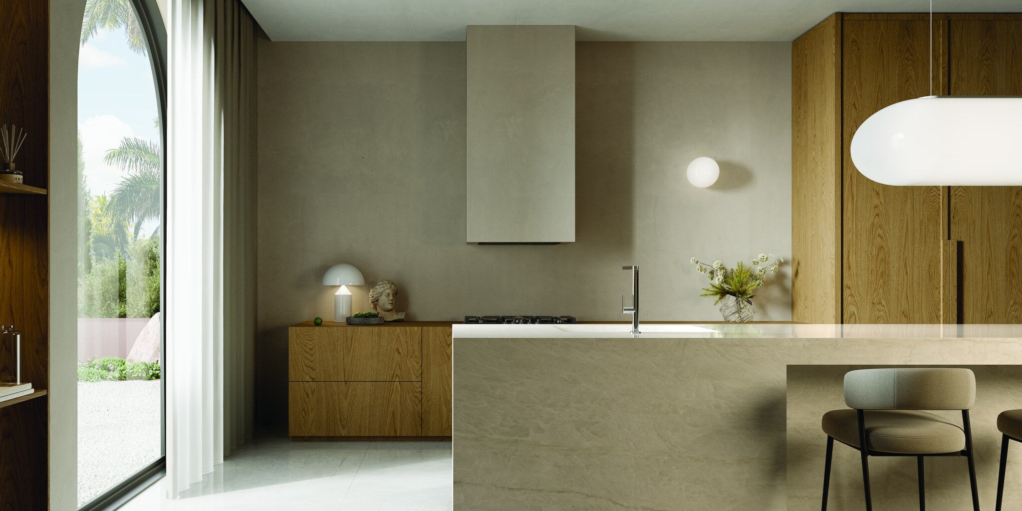 Kitchen island with a KLUDI-QORD mixer in front of a garden window