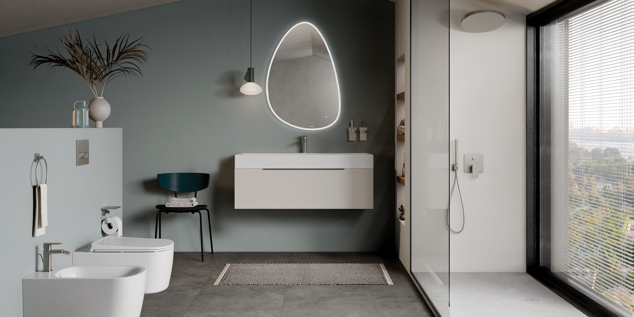 Bathroom with a wall-hung bidet, a long vanity and a walk-in shower in front of a city window