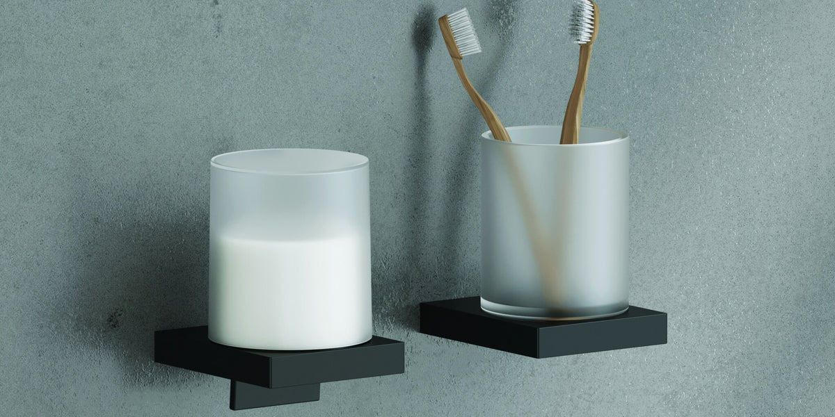 Wall-mounted tumbler and toothbrush tumbler on matt black shelves